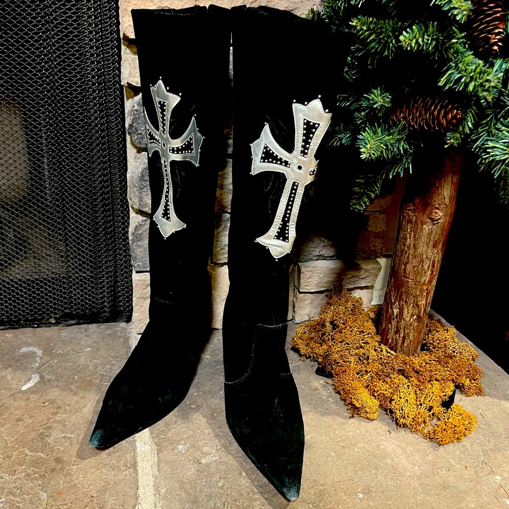 Black boots with silver crosses on them